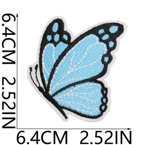 Close-up of blue and white butterfly embroidery patch showing 6.4cm size measurements