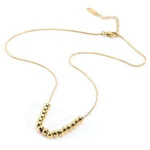 Collier élégant en acier titane or 18K avec seize perles rotatives sur chaîne fine