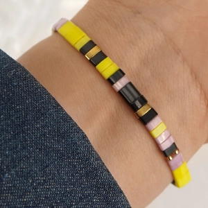 Bohemian Tila bead bracelet with yellow, black, purple, and gold rectangular beads