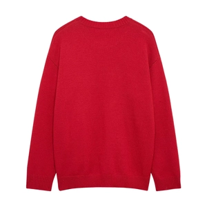 Detail view of the red crew neck knit sweater back with ribbed cuffs and hem