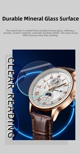 Detail of rose gold business watch with moon phase dial and brown leather strap