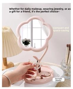 Close-up of pink sunflower makeup mirror tray with jewelry storage for rings