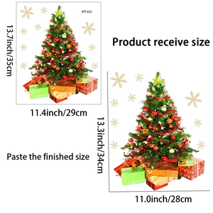 Detail view of Christmas tree and snowflake static window stickers with size specifications