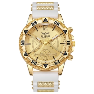 Montre à quartz pour homme avec boîtier doré et bracelet en silicone blanc