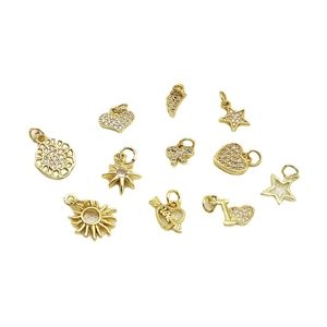 Set of 11 gold-plated micro-paved charms including heart, star, and Hamsa hand shapes