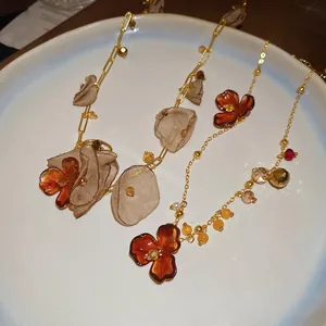 Acrylic chiffon flower crystal pendant necklace with amber resin petals on gold chain