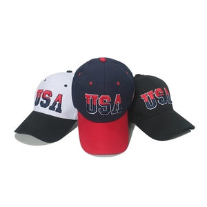 Three USA embroidered baseball hats in black, white, and navy featuring American flag colors