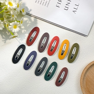 10-piece set of matte oval metal BB hair clips in assorted vibrant candy colors