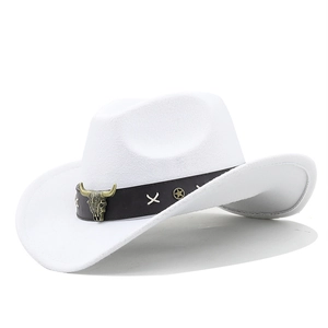 Detail of white western cowboy hat with cattle skull charm and star studs on brown band