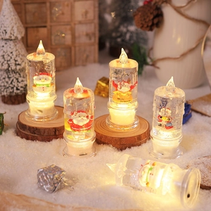 LED Christmas water candle with Santa figurine and warm sparkling glitter effect