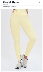Moonlight yellow high waist seamless yoga pants showing elastic fitness fabric detail