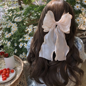 Elegant large beige organza bow hair clip for women with shimmering ruffle edge
