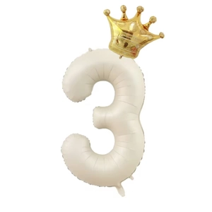 Detail of cream 40-inch number 3 foil balloon with a gold crown for birthday party
