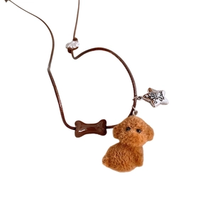 Cute plush dog pendant necklace with star charm and bone beads on adjustable brown cord