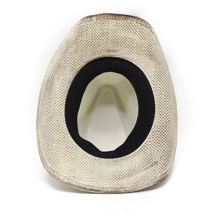 Detail shot of the cream woven straw hat showing the inner sweatband and brim binding