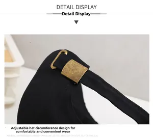 Detail view of cotton baseball cap with adjustable vintage gold metal buckle