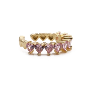 Gold-plated ear cuff featuring sparkling pink heart-shaped cubic zirconia in a line