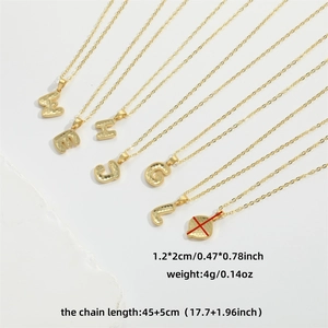 Minimalist gold initial pendant necklaces with chain length and size details