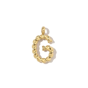 Detailed view of an 18k gold plated stainless steel letter G pendant with twisted rope texture