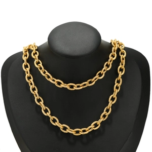8mm gold-colored stainless steel twist rope chain necklace displayed on a black mannequin