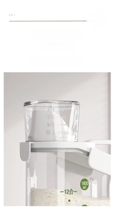 Detail of transparent 1800ml kitchen storage jar with a scaled measuring cup lid