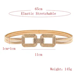 Detailed view of elastic gold spring chain waist belt with dual square metal buckles