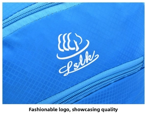 Macro shot of blue ripstop nylon fabric and white Lslk logo on lightweight outdoor backpack