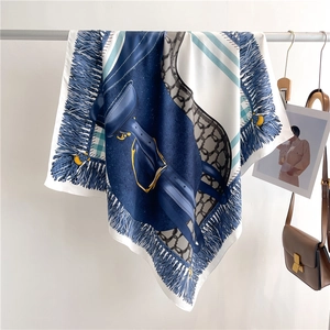 Luxury 90x90cm silk square scarf featuring blue saddle and chain print with tassel edges