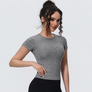 Detail of grey heathered slim fit yoga t-shirt with breathable athletic fabric texture