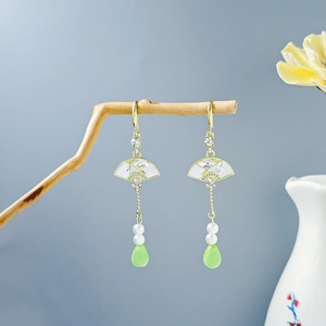 Detailed view of Chinese fan-shaped earrings with pearls and green water-drop pendants