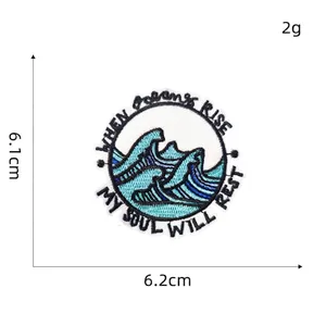 Detail showing blue ocean wave embroidery patch dimensions 6.2 cm with text engraving