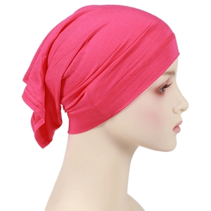 Detail of rose red modal hijab cap showing high elasticity fabric texture and stitching