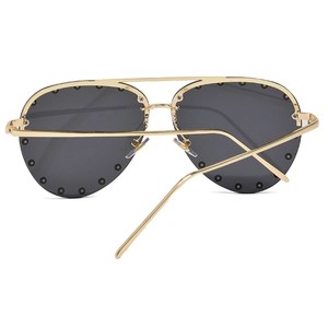 Fashionable aviator sunglasses with gold metal semi-rimless frame and black rivet accents