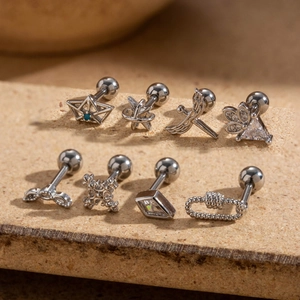 Eight-piece set of silver stainless steel cartilage stud earrings with turquoise and crystals