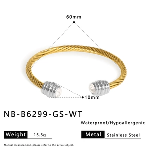 Detail of twisted cable bangle showing 60mm diameter and waterproof stainless steel features