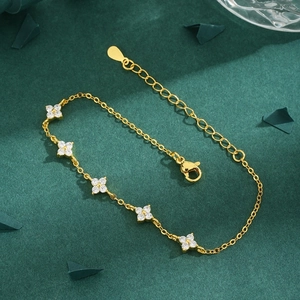 Elegant gold flower bracelet with five zircon-set petals and adjustable chain for women