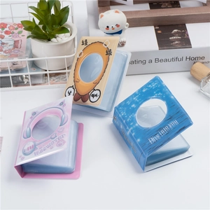 Three colorful 3-inch mini photo albums for Instax film and k-pop photocards