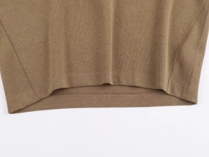 Macro view showing hem stitching and soft knit fabric texture of the tan lounge set