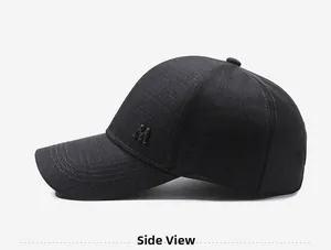 Side view detail of casual baseball cap with 3D embroidered M logo on textured fabric