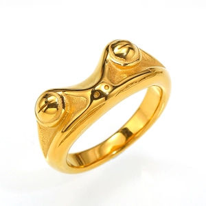 Macro shot of polished gold ring featuring industrial screw head design details