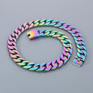 Macro shot of 24mm rainbow iridescent stainless steel Cuban link bracelet with box clasp