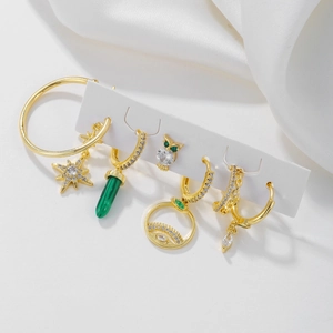 Golden S925 silver needle earring set featuring geometric star charms and evil eye pendants