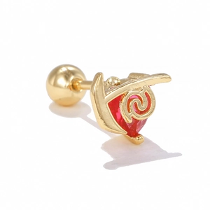 Detailed macro view of gold-plated spiral ear stud with heart-shaped red zircon gem