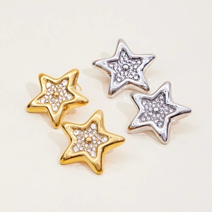 Boucles d'oreilles en forme d'étoile en or et argent serties de strass brillants