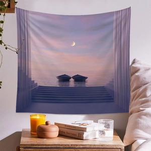 Cozy bedroom scene featuring a moonlit seascape wall tapestry in soft pink and purple hues
