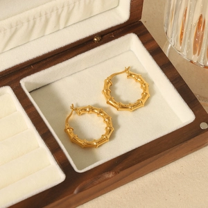 Bamboo textured 18K gold plated stainless steel hoop earrings in a premium wooden box
