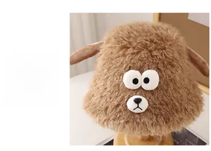 Close-up of fluffy brown sheep bucket hat featuring cute ears and embroidered animal facial details