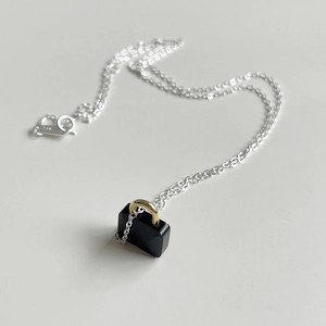 Elegant 925 sterling silver padlock necklace with black zircon and gold accents