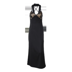 Detail of backless black satin dress showing lace splicing and cross straps