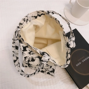Top view of floral canvas tote bag showing spacious interior and durable cotton lining